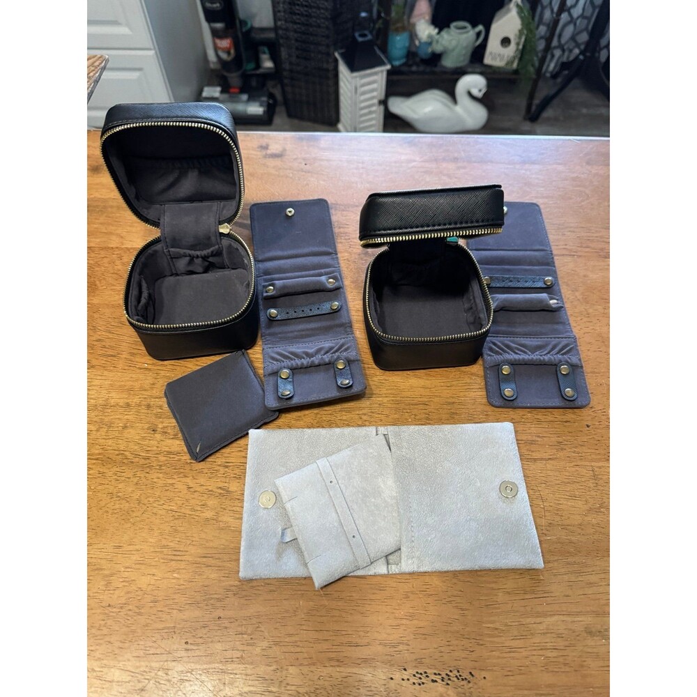 2- travel jewelry boxes, and one jewelry fabric holder with snap closure